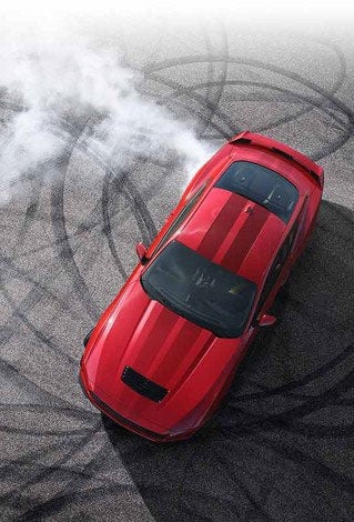 Overhead view of a 2024 Ford Mustang® model with tire tracks on pavement | Crow-Moddie Ford in Burlington KS