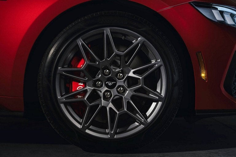 2024 Ford Mustang® model with a close-up of a wheel and brake caliper | Crow-Moddie Ford in Burlington KS