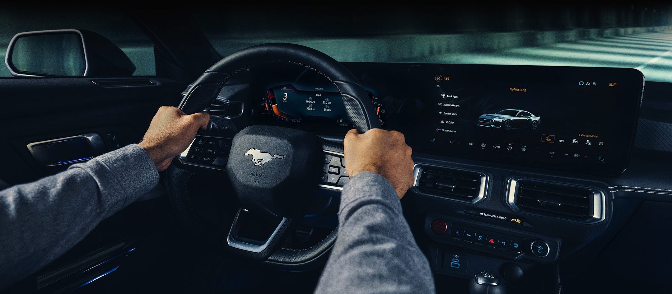 A 2024 Ford Mustang® model interior with a person driving | Crow-Moddie Ford in Burlington KS